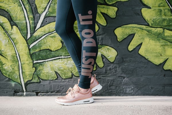 Bows & Sequins wearing navy & copper Just Do It leggings with Nike rose gold sneakers.