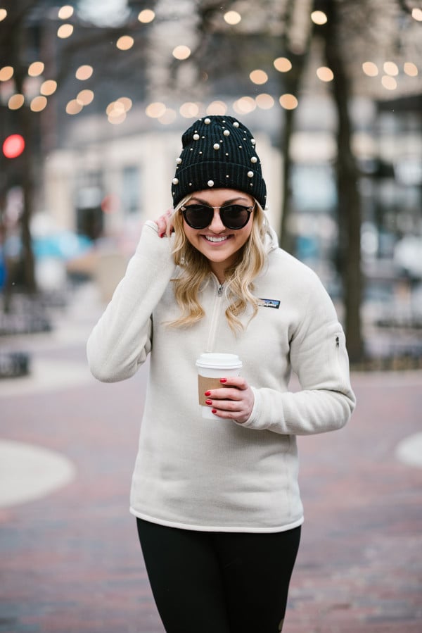 Bows & Sequins wearing a pearl beanie and a Patagonia pullover.