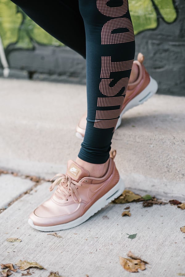 Bows & Sequins wearing rose gold Nike Air Max Thea sneakers.