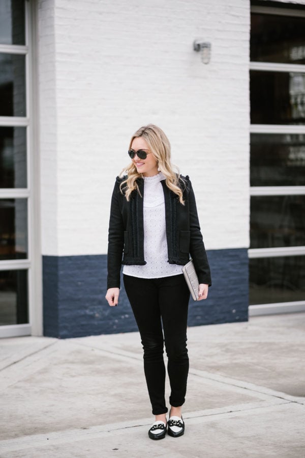 Bows & Sequins wearing a casual black and white outfit in Chicago.