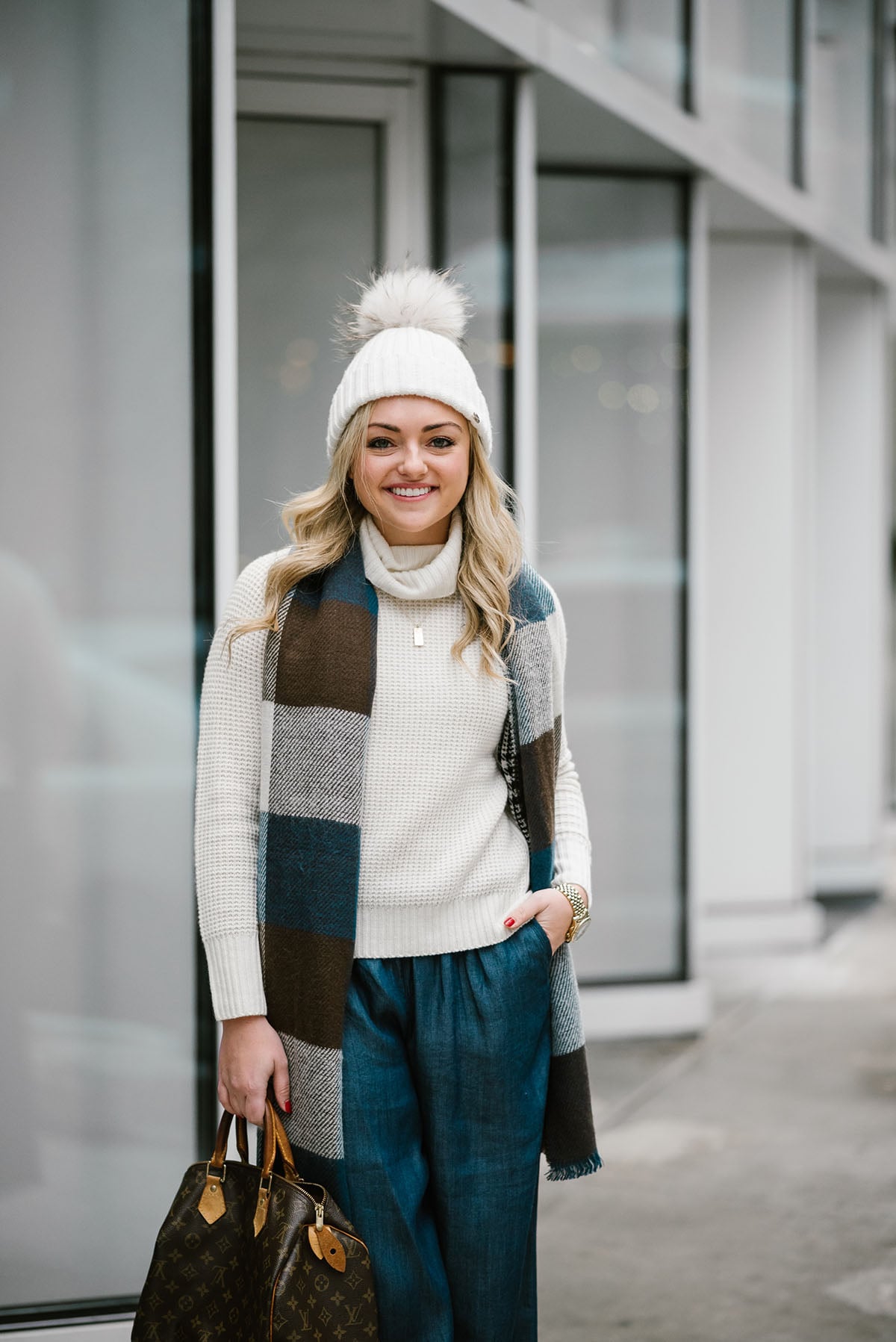 Bows & Sequins styling a turtleneck sweater for a cute winter outfit.
