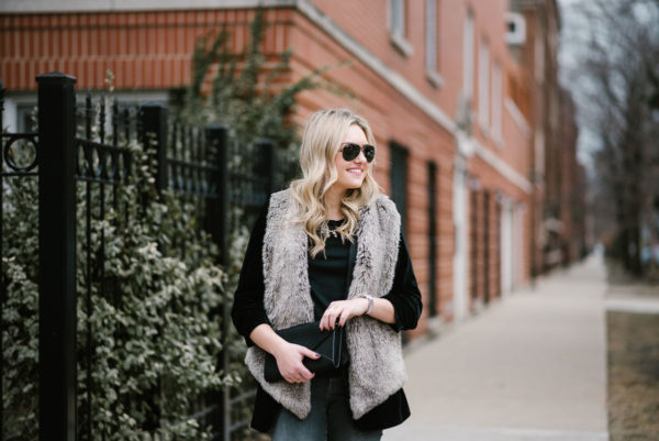 Bows & Sequins styling a faux fur vest outfit.