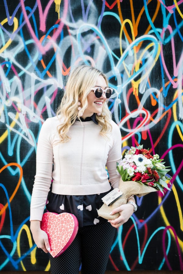 Bows & Sequins in front of the Bleeding Hearts mural in Wicker Park with a Flowers for Dreams bouquet in Chicago.