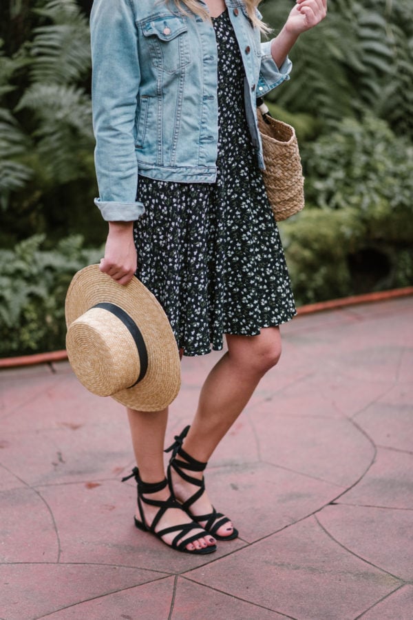 Bows & Sequins wearing black M.Gemi sandals with a Janessa Leone hat.