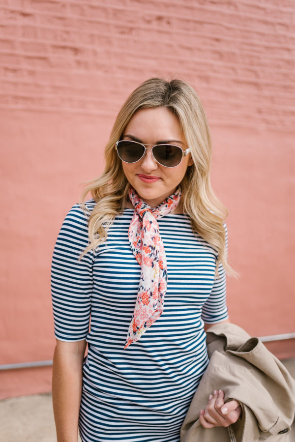 Bows & Sequins styling a floral scarf with a striped tee and white aviator sunglasses.