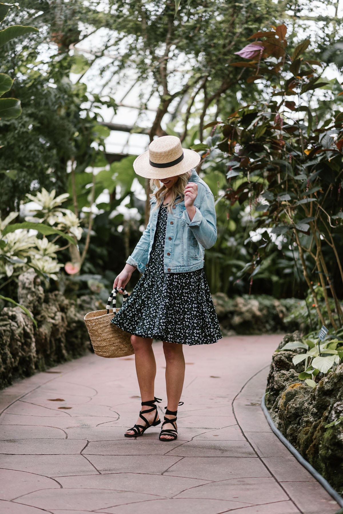 Bows & Sequins styling an Old Navy sundress with a Janessa Leone hat in Chicago.