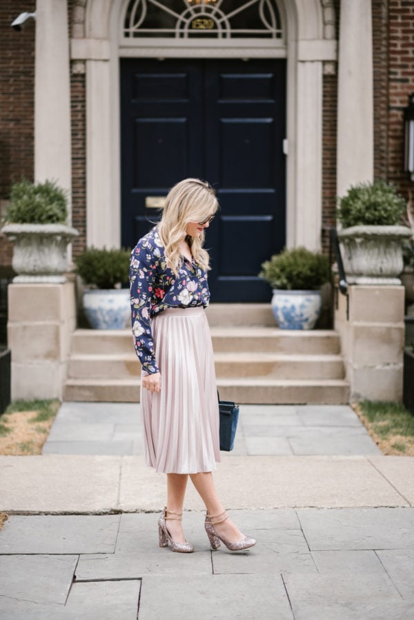 Fashion blogger Bows & Sequins wearing a Rebecca Taylor floral blouse and a pink Rachel Roy midi skirt in Chicago.