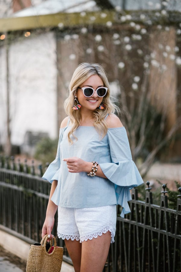 Chicago blogger Bows & Sequins wearing a bell sleeve chambray top and Kensie white eyelet shorts with Nordstrom sunglasses.
