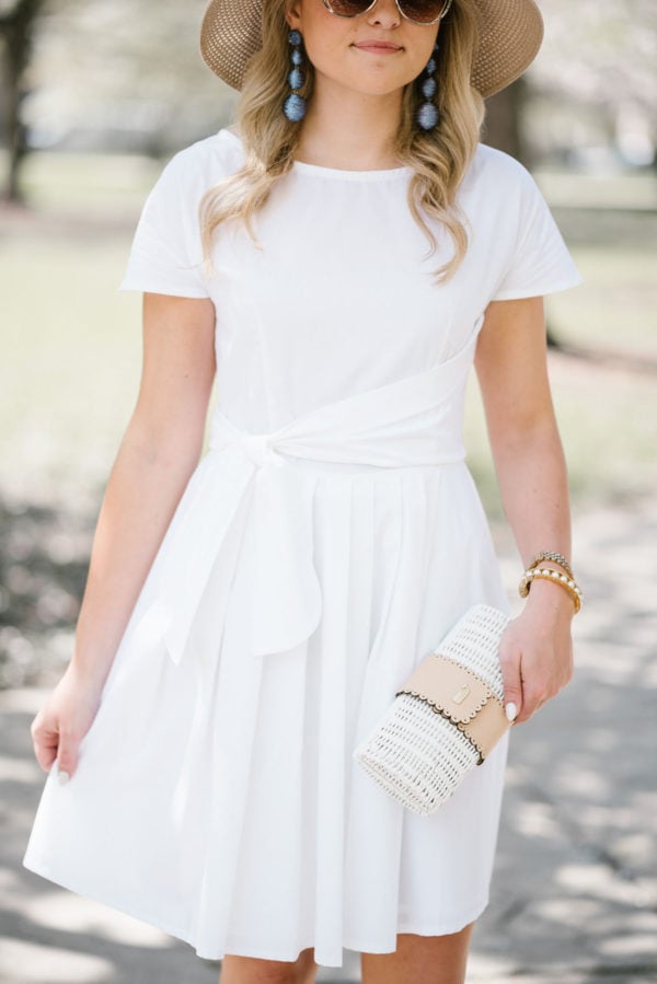 Bows & Sequins styling a white Vineyard Vines dress.