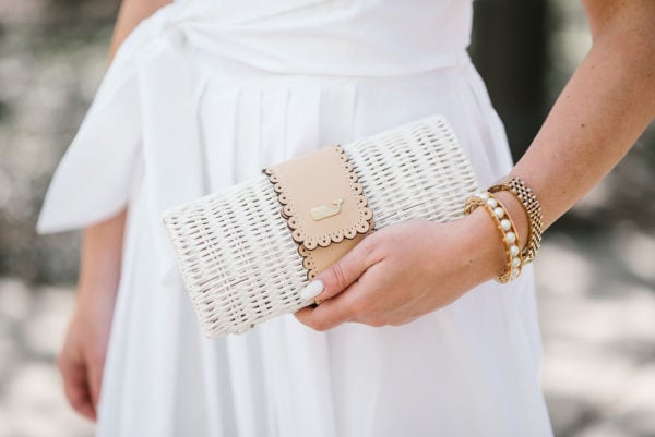 Bows & Sequins styling a white wicker rattan clutch from Vineyard Vines.