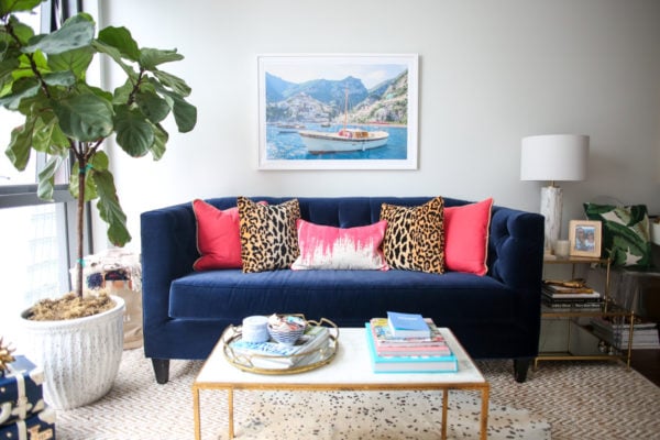 Bows & Sequins Chicago living room decor with a fiddle leaf fig, Gray Malin print, marble coffee table with a gold mirror tray