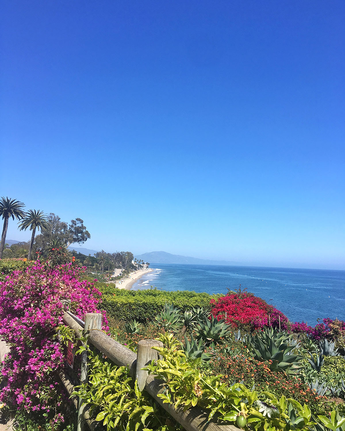 Travel blogger Bows & Sequins photo from Butterfly Beach in Santa Barbara, California.