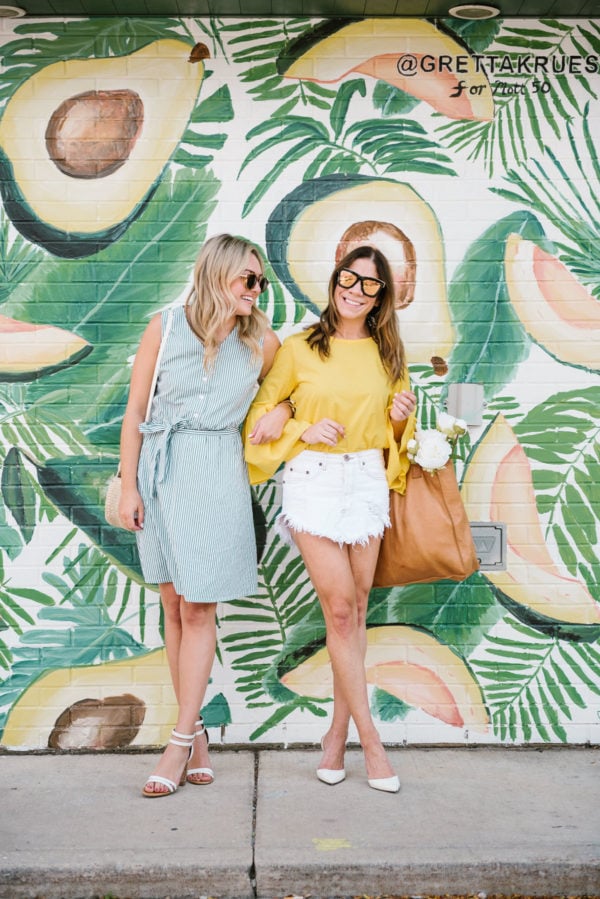 Jessica from the blog Bows & Sequins wearing a button down tie waist dress and Hallie Wilson of Among Other Things wearing a flare sleeve blouse and denim skirt.