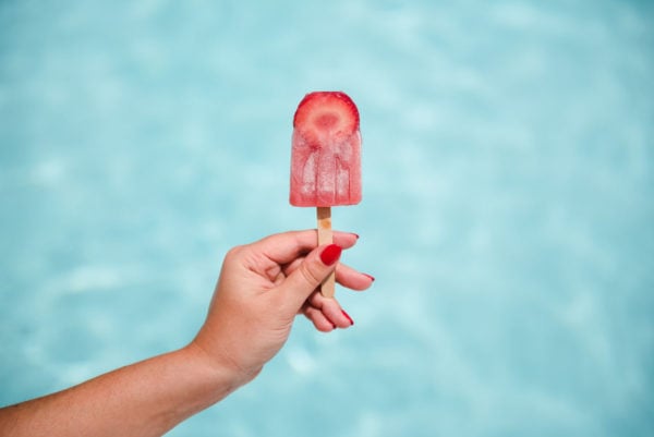 Bows & Sequins sharing a recipe for boozy strawberry and rosé popsicles.