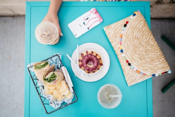 Bows & Sequins at Colectivo Coffee in Chicago with a White Elephant Designs pom pom clutch.