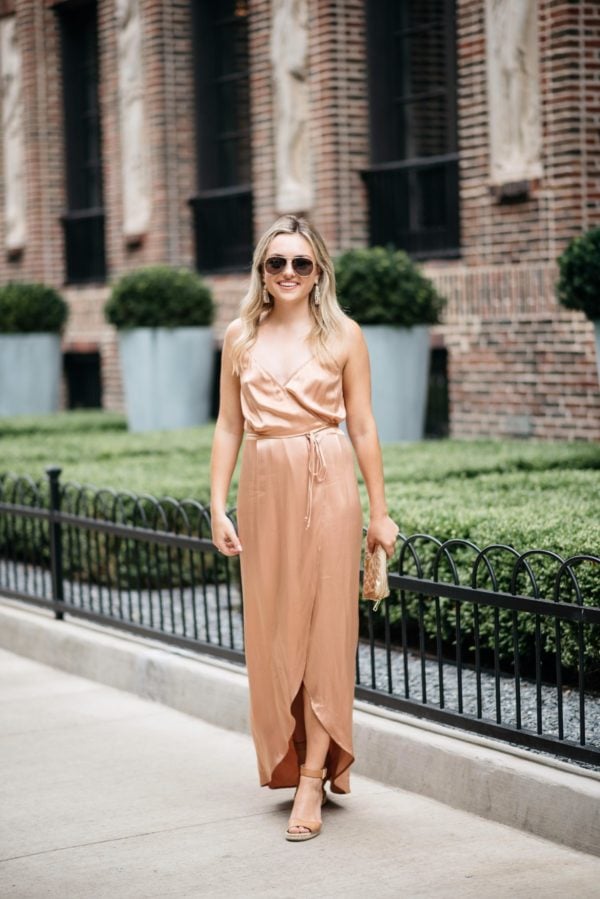 Bows & Sequins styling a Wayf metallic wrap silk dress.