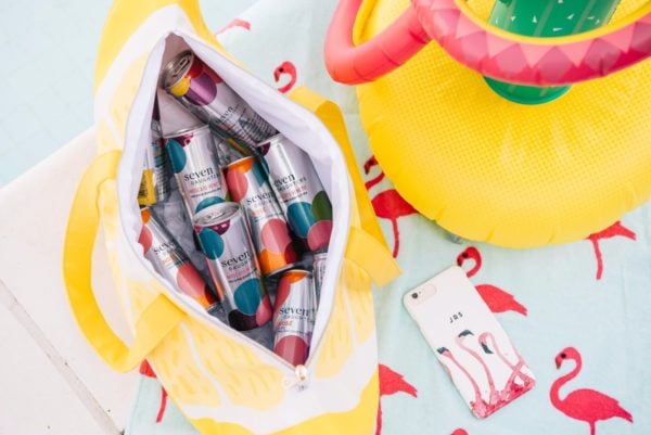 Bows & Sequins throws a summer pool party with Seven Daughters wine cans.