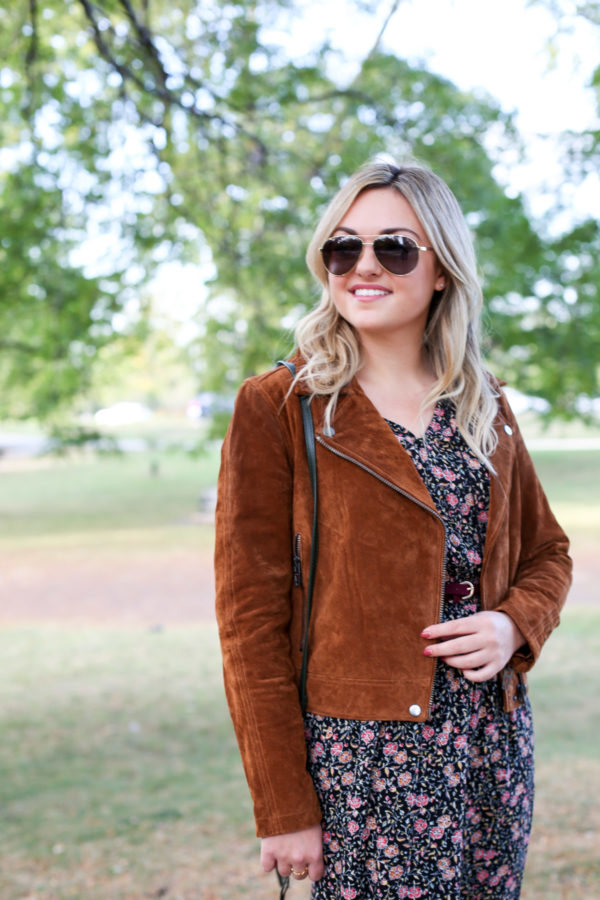 Bows & Sequins styling a cognac suede jacket and floral dress.