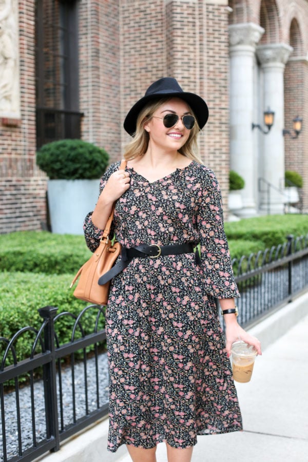 Bows & Sequins wearing a floral Old Navy midi dress with black accessories.