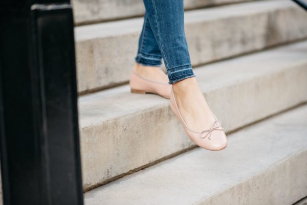 Bows & Sequins wearing raw hem Old Navy jeans with pink Margaux Ballerina ballet flats.