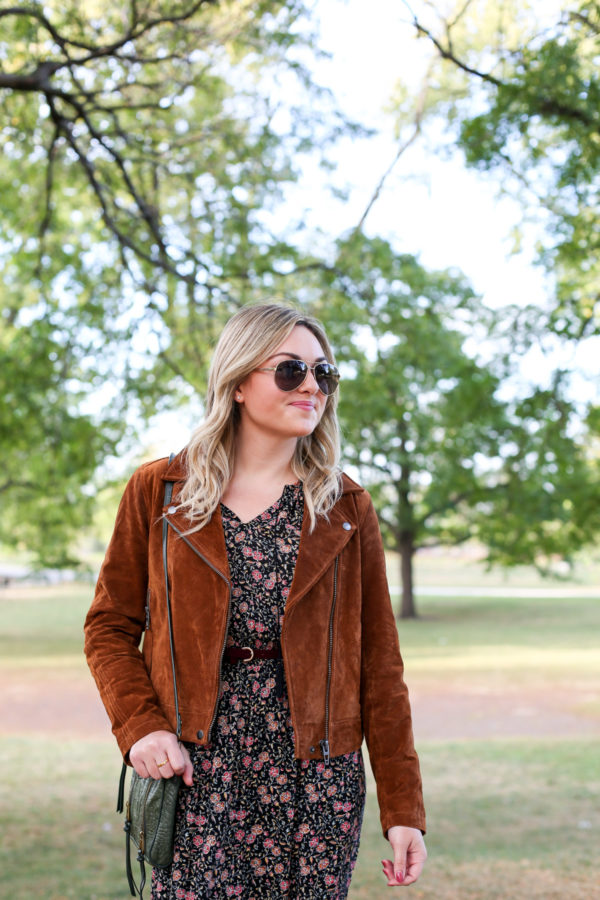 Bows & Sequins wearing a Blank NYC cognac suede jacket and aviators.