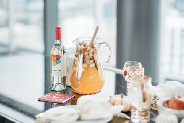 Jessica Sturdy shares her recipe for apple cinnamon Seven Daughters moscato wine for a Friendsgiving Thanksgiving dinner party.
