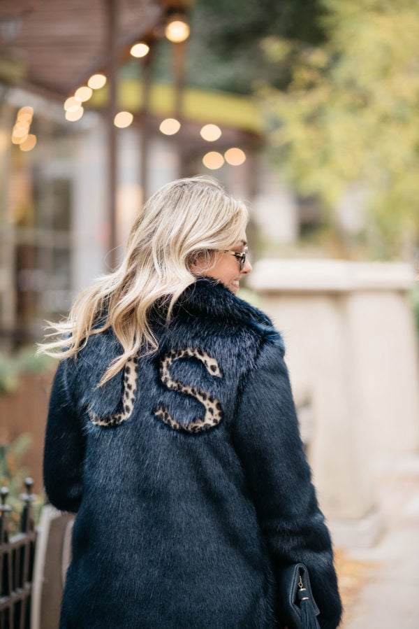 Jessica Sturdy wearing a custom leopard print monogram faux fur coat.