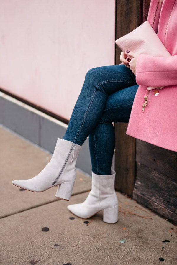 Chicago blogger Jessica Rose Sturdy wearing a J.Crew pink cocoon coat, Rag & Bone skinny jeans, and Linea Paolo suede ankle booties.