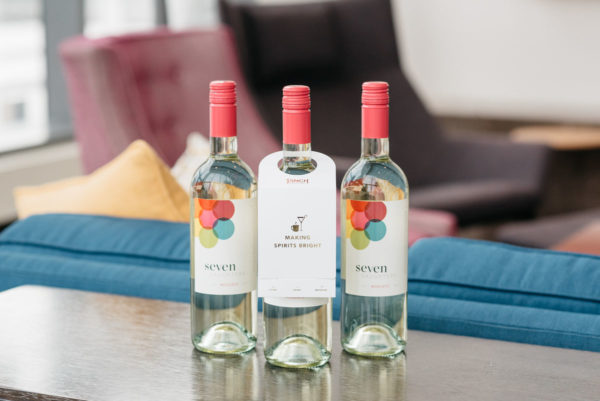 Jessica Rose Sturdy reviews Seven Daughters moscato wine bottles.