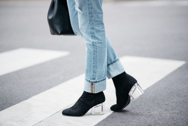 Jessica Sturdy of Bows & Sequins wearing Levi 501 jeans with Steve Madden lucite booties.