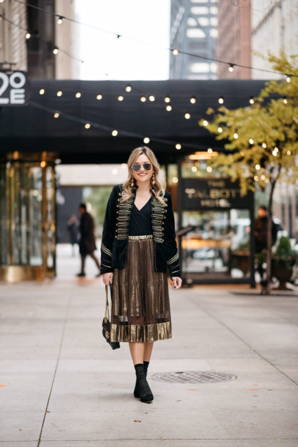 Chicago blogger Jessica Rose Sturdy wearing Ray-Ban aviators, Blank NYC black velvet and gold embroidered band jacket, J.Crew bodysuit, gold midi skirt, black & gold shimmer socks, and Kate Spade black suede pumps with Kenneth Jay Lane gold earrings and a Gucci Marmont black leather bag.