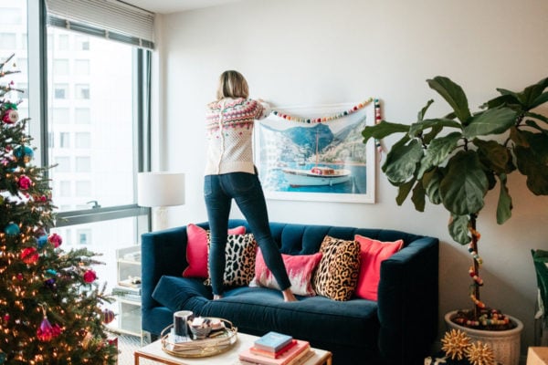 Jessica Sturdy decorating her apartment in Chicago for Christmas.
