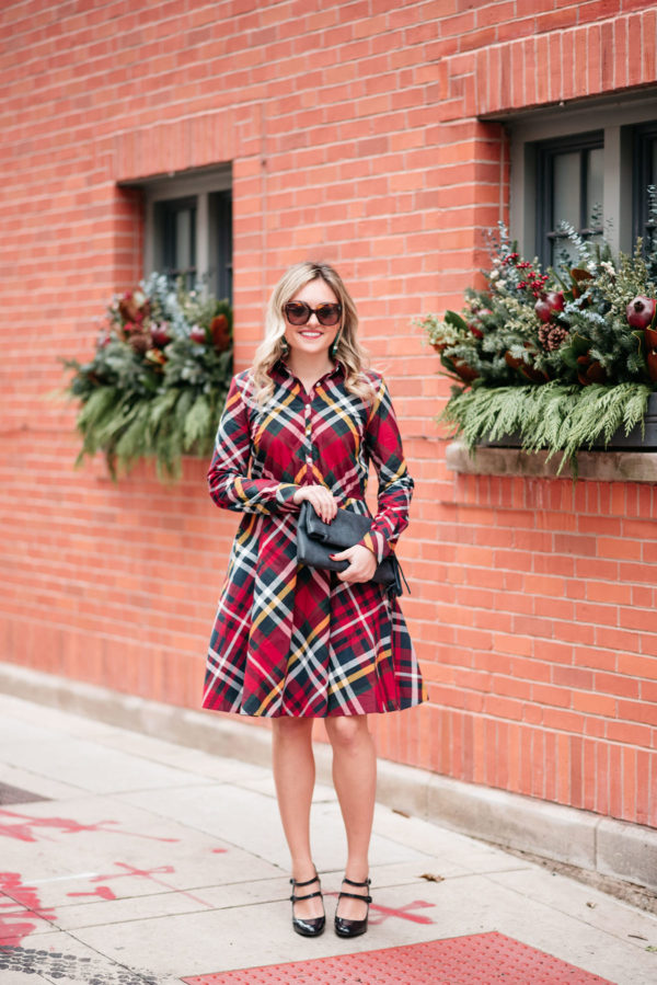 Jessica Sturdy wearing a plaid Brooks Brothers dress for the holidays.