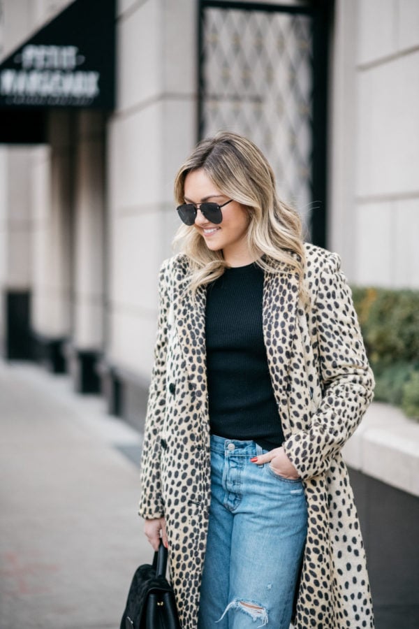 Chicago lifestyle blogger Jessica Sturdy wearing Le Specs aviators, Bows & Sequins leopard coat, Old Navy ribbed sweater, Levi's 501 boyfriend jeans with a Polene Paris top handle bag.