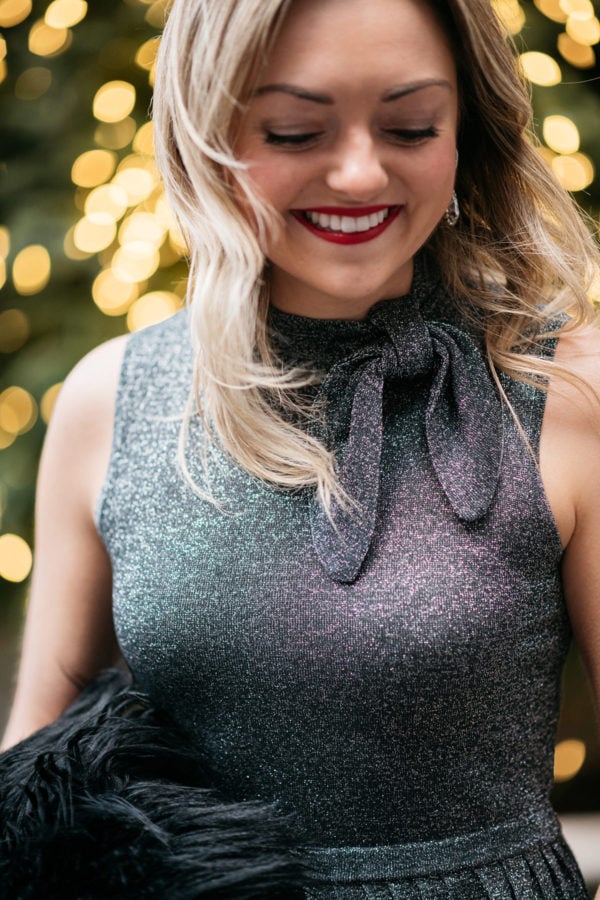 Jessica Sturdy wearing a silver knotted bow dress by Kate Spade.