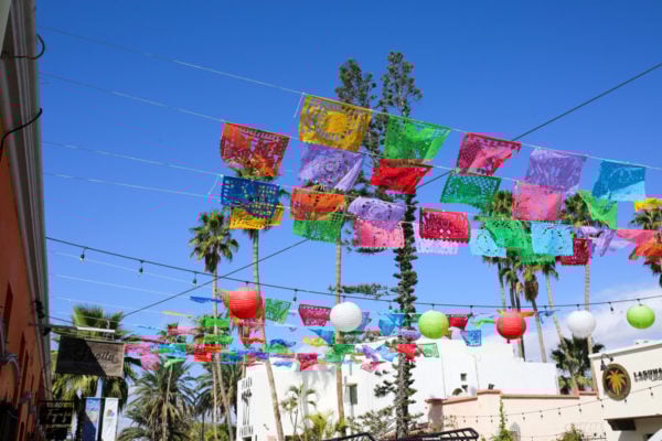 Jessica Sturdy shares photos from exploring San Jose del Cabo in Mexico. Colorful flags and paper lanters