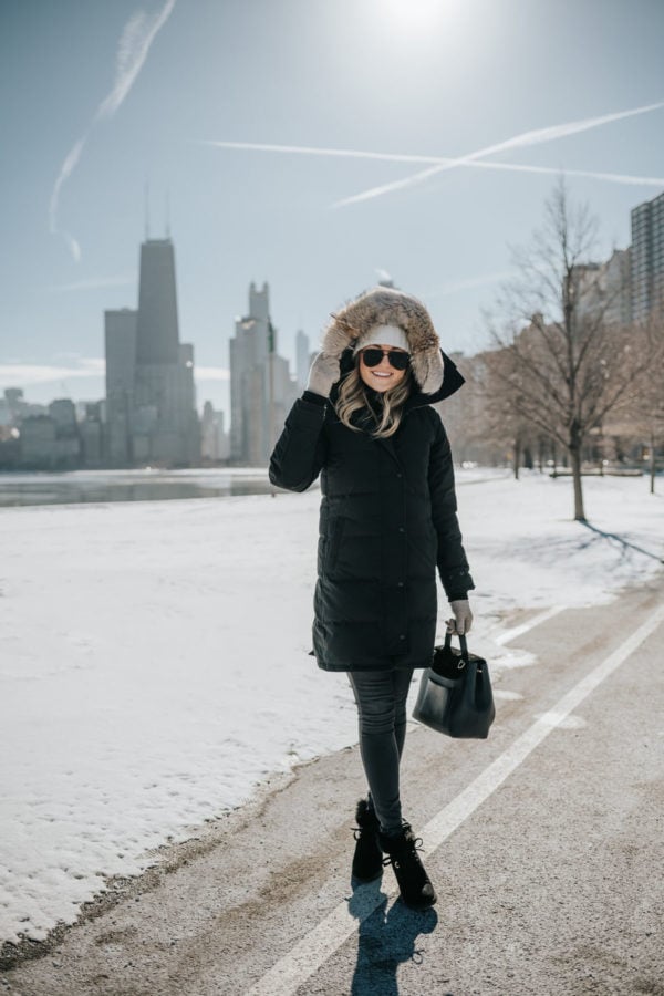 Jessica Sturdy shares tips for surviving cold winters in Chicago, wearing a Canada Goose coat.