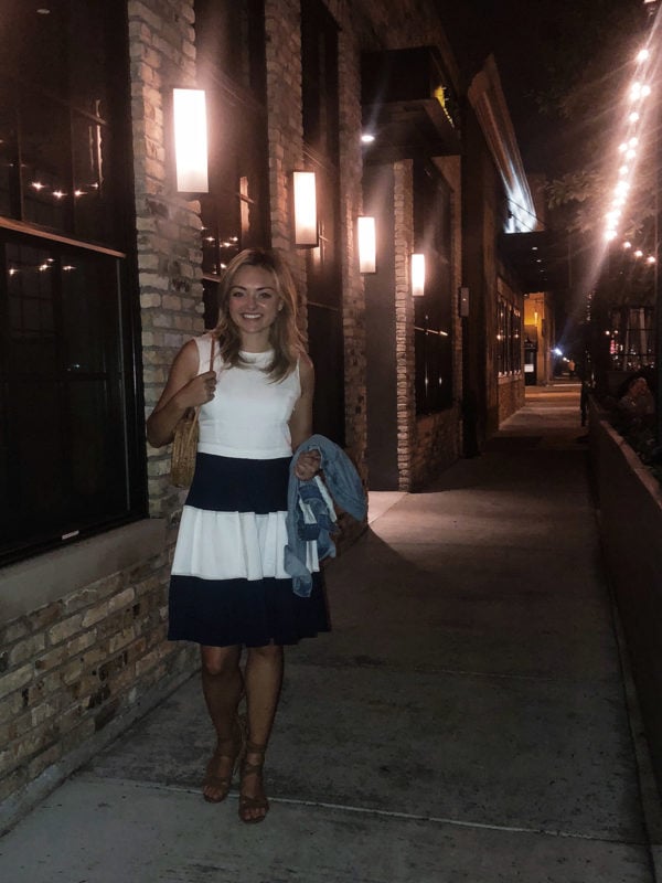 Jessica Sturdy at Ella Elli in Chicao wearing a striped dress.