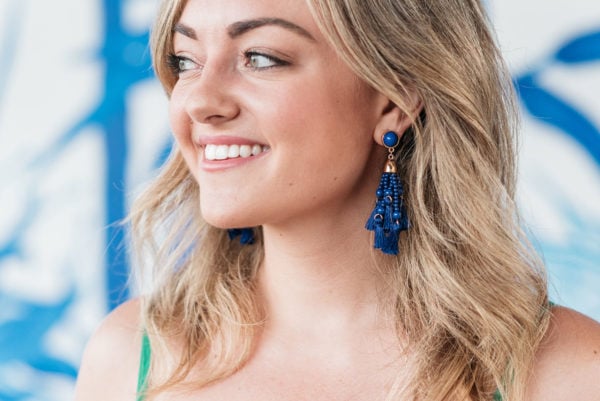 Jessica Sturdy wearing blue tassel earrings from BaubleBar.