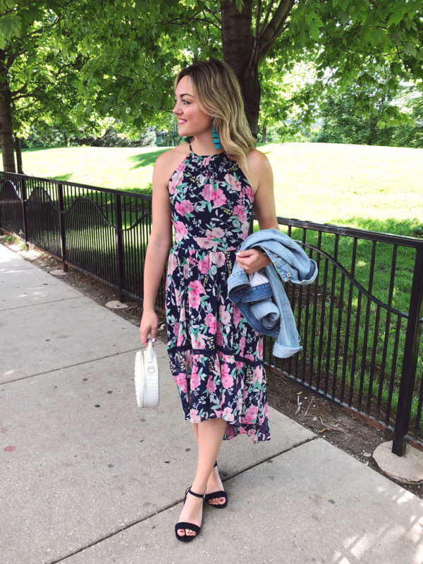 Chicago travel blogger wearing a floral Eliza J dress with a denim jacket for a summer bridal shower.
