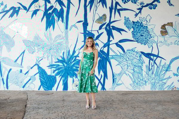 Chicago lifestyle blogger Jessica Sturdy styling a green midi length dress with silver ankle-strap heels.