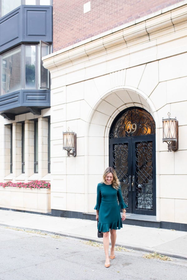 Chicago blogger Bows & Sequins styling an emerald green dress for the work week.