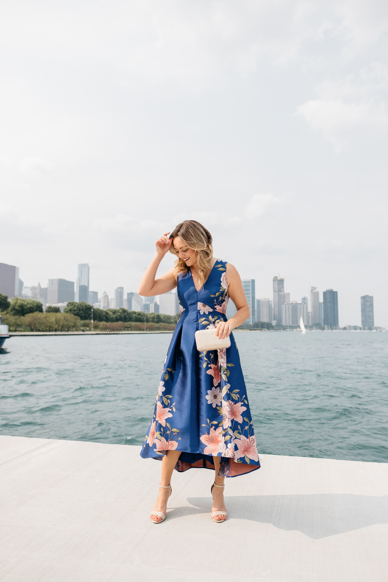 Chicago fashion blogger Jessica Sturdy wearing a black tie wedding guest dress in one of the most photogenic spots in the city.