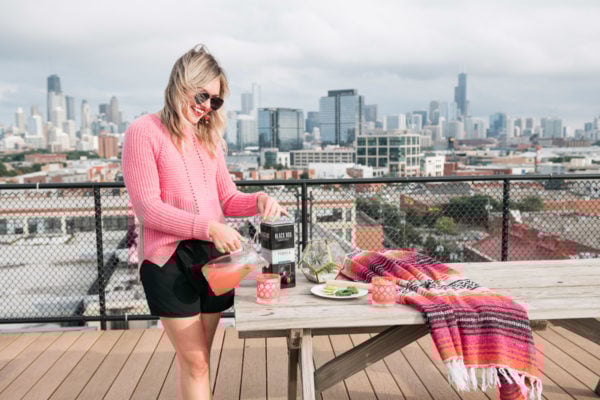 Chicago lifestyle blogger Jessica Sturdy shares a recipe for a Spicy Watermelon Margarita on a Chicago rooftop.