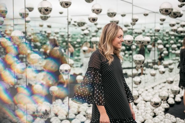 Chicago fashion lifestyle blogger Jessica Sturdy of Bows & Sequins in the Infinity Mirrors room. 