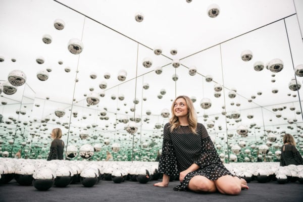 Women's travel lifestyle blogger Jessica Sturdy of Bows & Sequins at the wndr museum in Chicago.