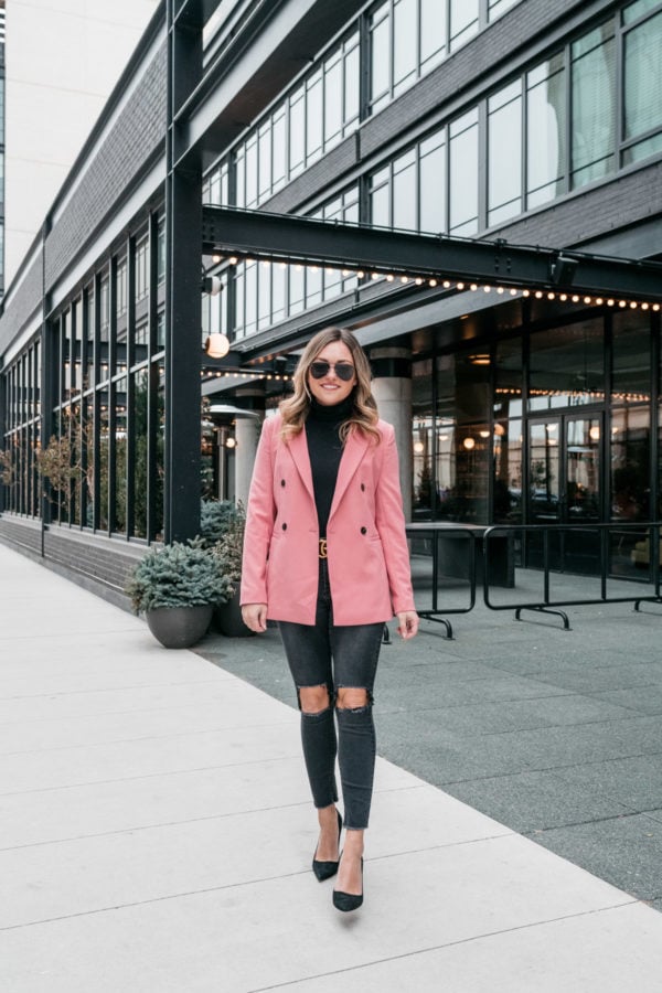 Everyday fashion influencer Jessica Sturdy shares a winter workwear outfit in front of the Ace Hotel in Chicago.