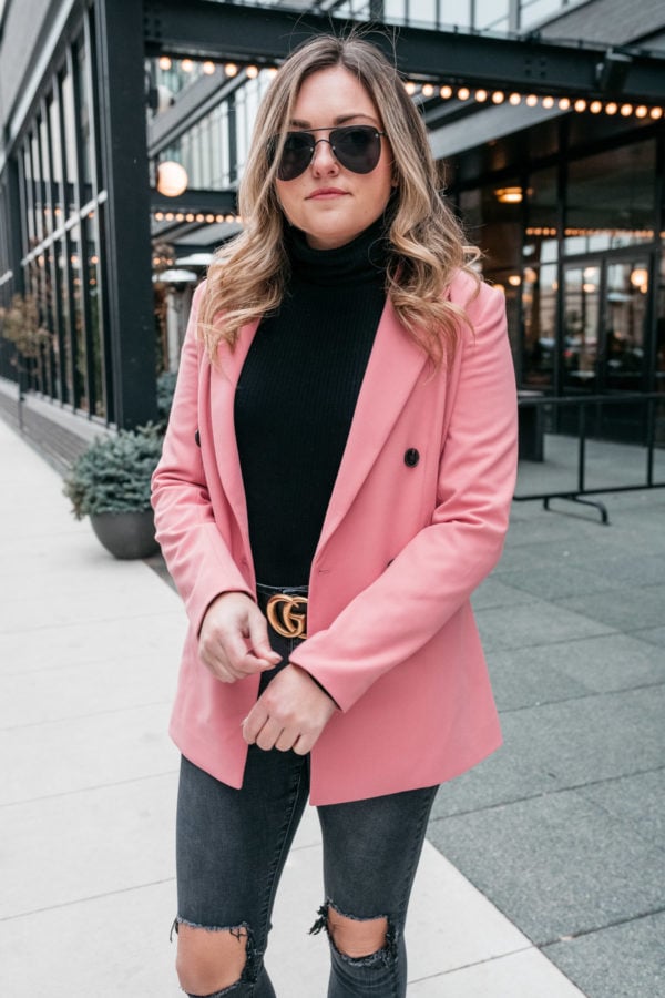 Chicago lifestyle blogger Bows & Sequins wearing a pink boyfriend blazer with a turtleneck and a Gucci belt.