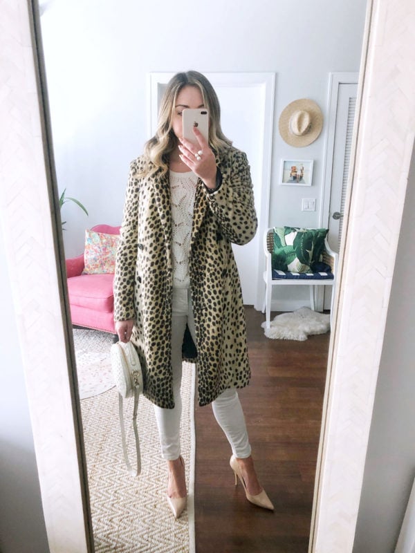 Fashion blogger Jessica Sturdy of Bows & Sequins styling a leopard coat with an all white outfit and a round circle bag.