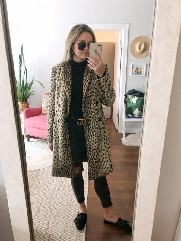 Bows & Sequins styling a long leopard coat by Malene Birger and a Gucci belt with black ripped jeans.